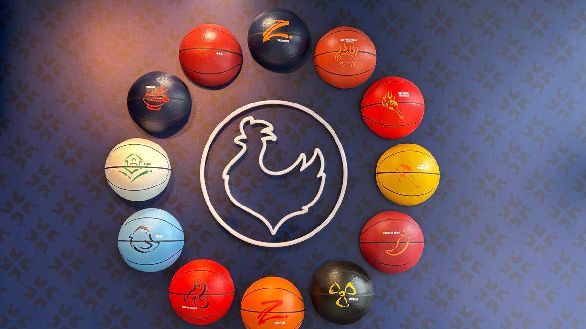 The “sauce wall” at the new Chapel Hill Zaxbys shows of the brands 12 signature sauces. 