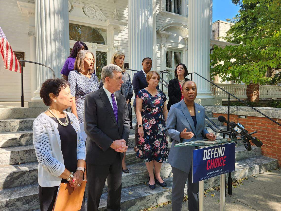 EMILY’s List President Laphonza Butler, at lectern, talks to reporters about Democratic women running for the state legislature at a press conference on Sept. 27, 2022 at North Carolina Democratic Party headquarters in downtown Raleigh, along with Gov. Roy Cooper, Democratic candidates, lawmakers and officials.