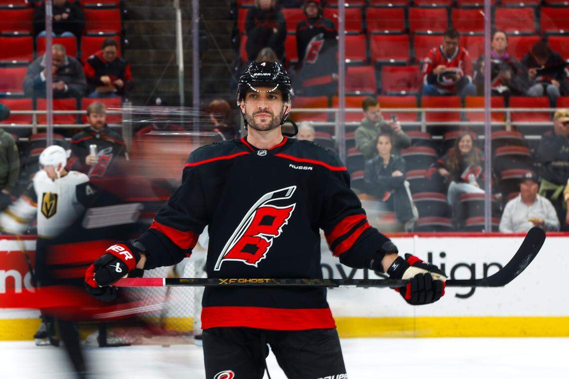 Shayne Gostisbehere of the Carolina Hurricanes looks on before the game against the Vegas Golden Knights at Lenovo Center on Oct. 28, 2025 in Raleigh, North Carolina.