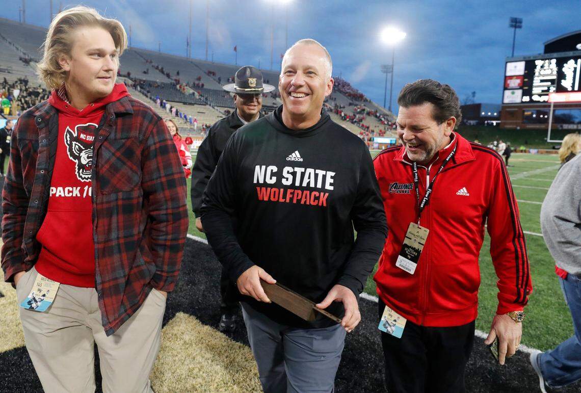 N.C. State head coach Dave Doeren laughs as he walks off the field after N.C. State’s 26-6 victory over Wake Forest at Allegacy Stadium in Winston-Salem, N.C., Saturday, Nov. 11, 2023.