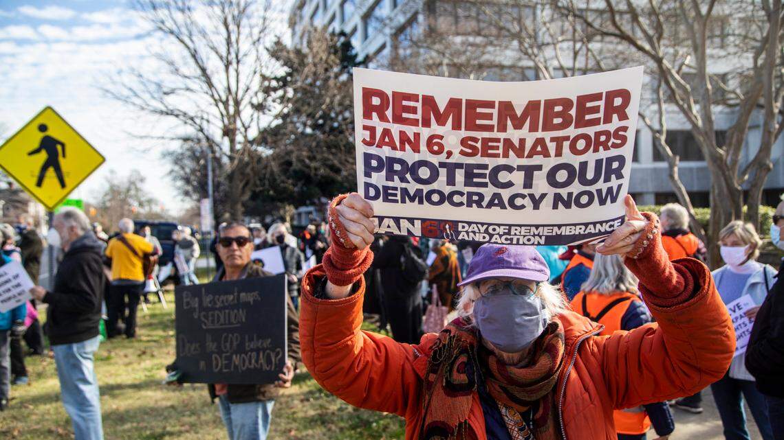 About 150 people demonstrate outside the Federal Building on New Bern Avenue in Raleigh on Thursday, Jan. 6, 2022. The protest, organized by the North Carolina Poor People’s Campaign, urged lawmakers to pass the Freedom to Vote Act and the Protecting Our Democracy Act.