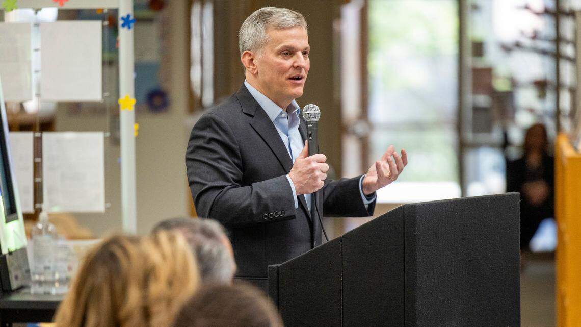 Then State Attorney General Josh Stein answers questions during a town hall on the impacts of social media on youth at Athens Drive High School in Raleigh on March 11, 2024. Now governor, Stein signed a bill into law on July 1, 2025 that requires students to turn their phones off during instructional time in school.