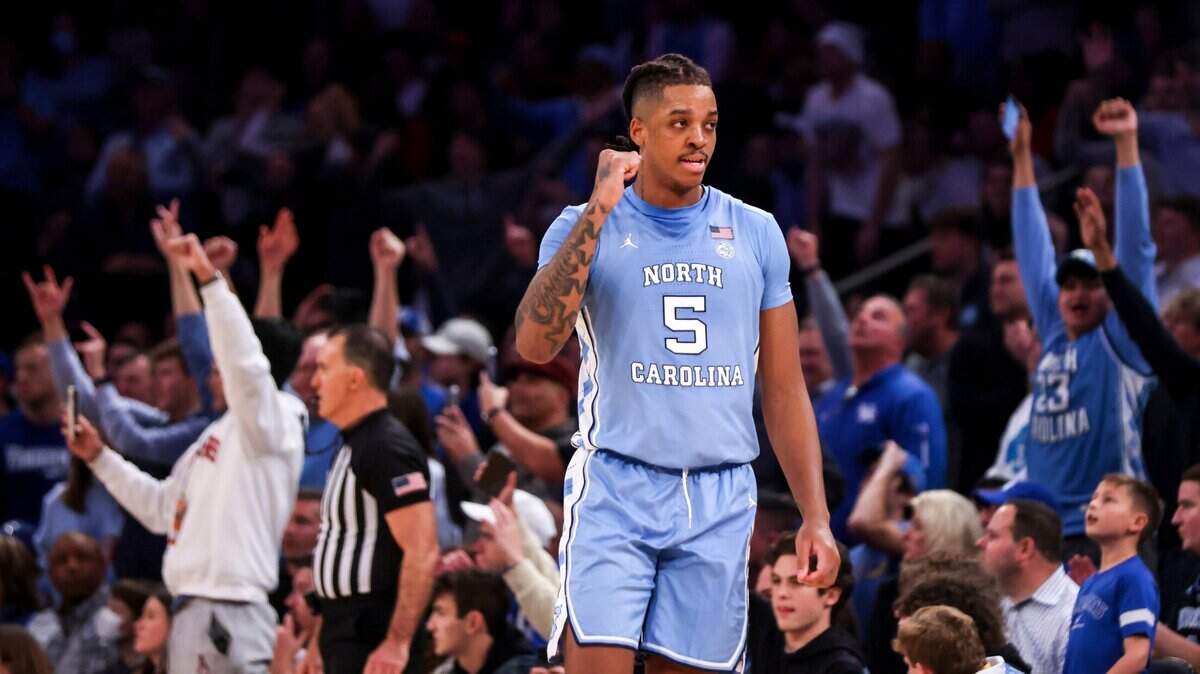 North Carolina forward Armando Bacot celebrates after beating Ohio State an NCAA college basketball game in the CBS Sports Classic, Saturday, Dec. 17, 2022, in New York. The Tar Heels won 89-84 in overtime. (AP Photo/Julia Nikhinson)