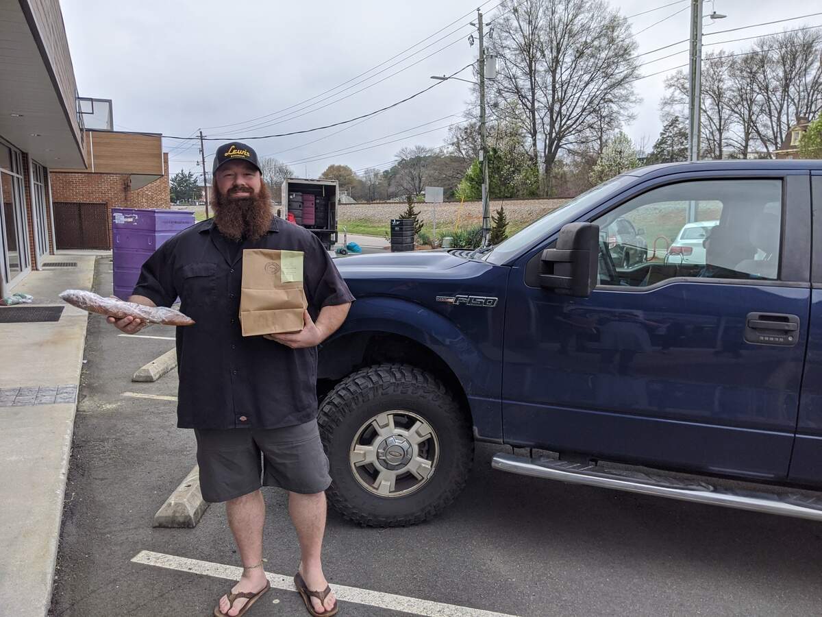 On March 17, business slowed dramatically for restaurants like the Postmaster in Cary, NC, because of the coronavirus. Gov. Roy Cooper said restaurants should close except for takeout and delivery. Christopher Lopez, chef of the Postmaster, said a few customers came to the restaurant to buy food and show support.