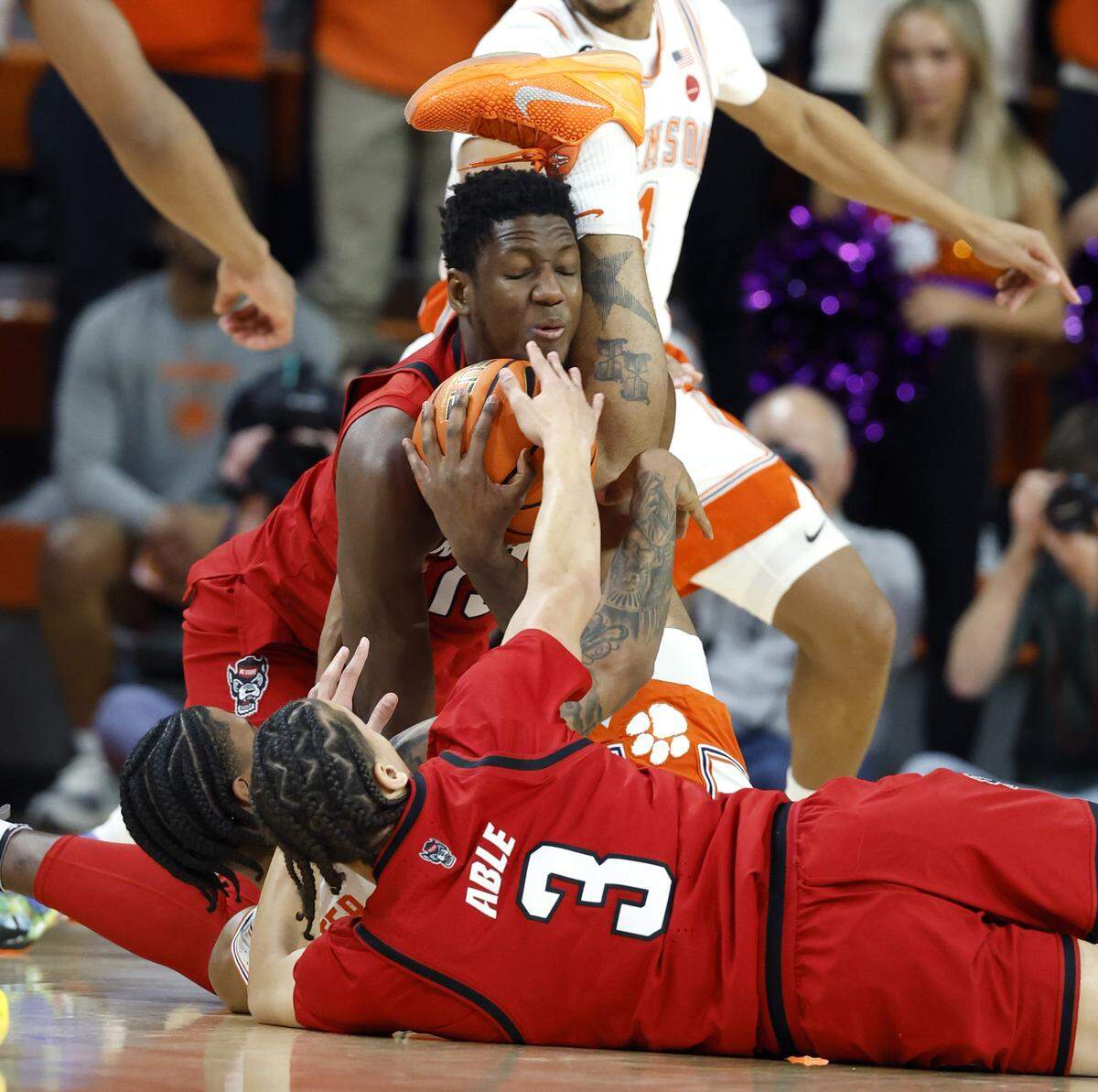N.C. State's Musa Sagnia (13) pulls in the loose ball during the first half of N.C. State’s game against Clemson at Littlejohn Coliseum in Clemson, S.C., Tuesday, Jan. 20, 2026.