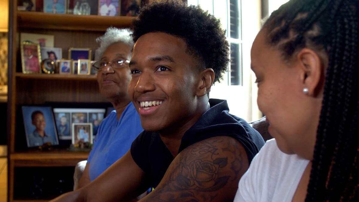 Ty-Shon Alexander of Charlotte with his family in the new documentary series “Hoop Portraits.”