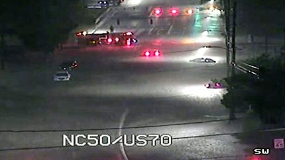 A DOT traffic camera shows several cars trapped in flash flood waters  Monday evening after heavy rains moved through parts of Wake County. 