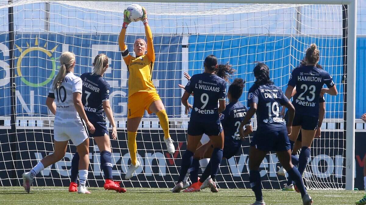 North Carolina Courage goalkeeper Stephanie Labbe makes save during the first half of an NWSL Challenge Cup soccer match against the Portland Thorns FC at Zions Bank Stadium Saturday, June 27, 2020, in Herriman, Utah.