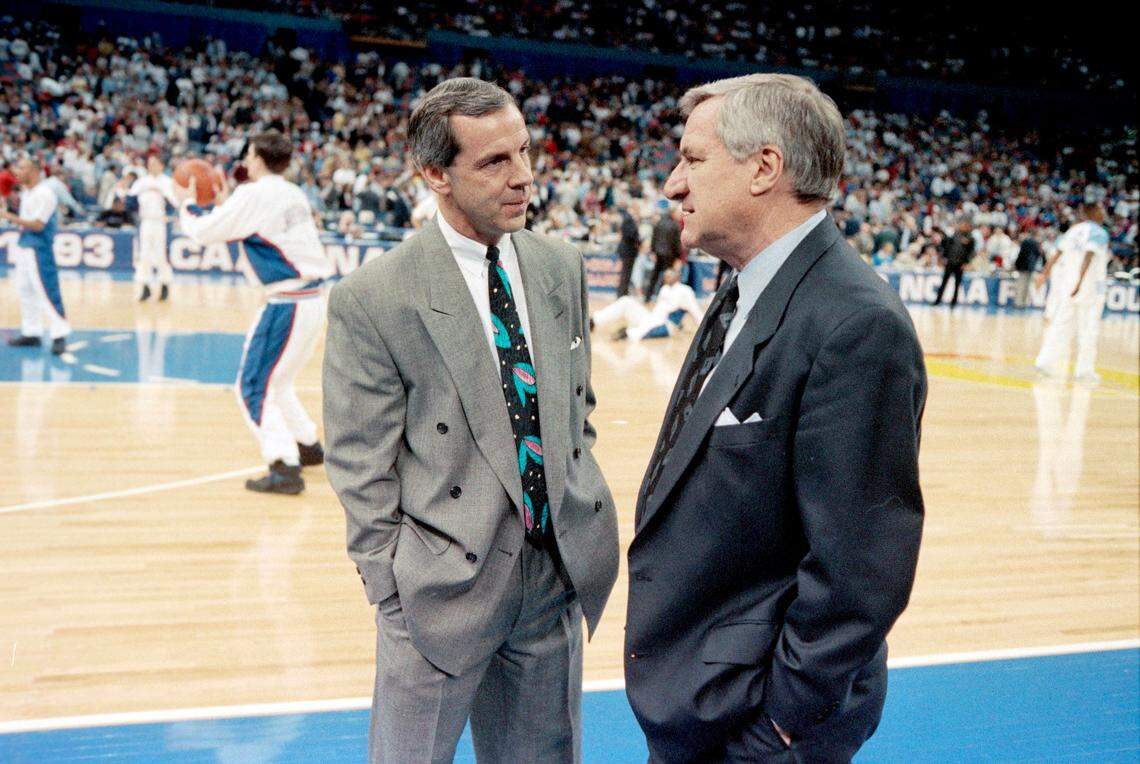 Kansas coach Roy Williams (left) talks with his mentor UNC coach Dean Smith before their two teams met in the 1993 National Championship semfinal game in New Orleans. UNC came out on top and went on to defeat Michigan to win the National Championship.