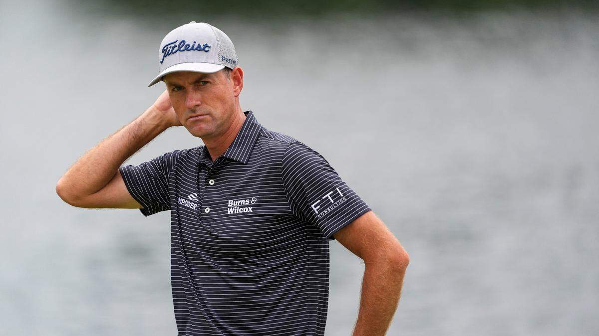 Webb Simpson reacts after playing on the 14th green during the first round of the Wells Fargo Championship golf tournament.