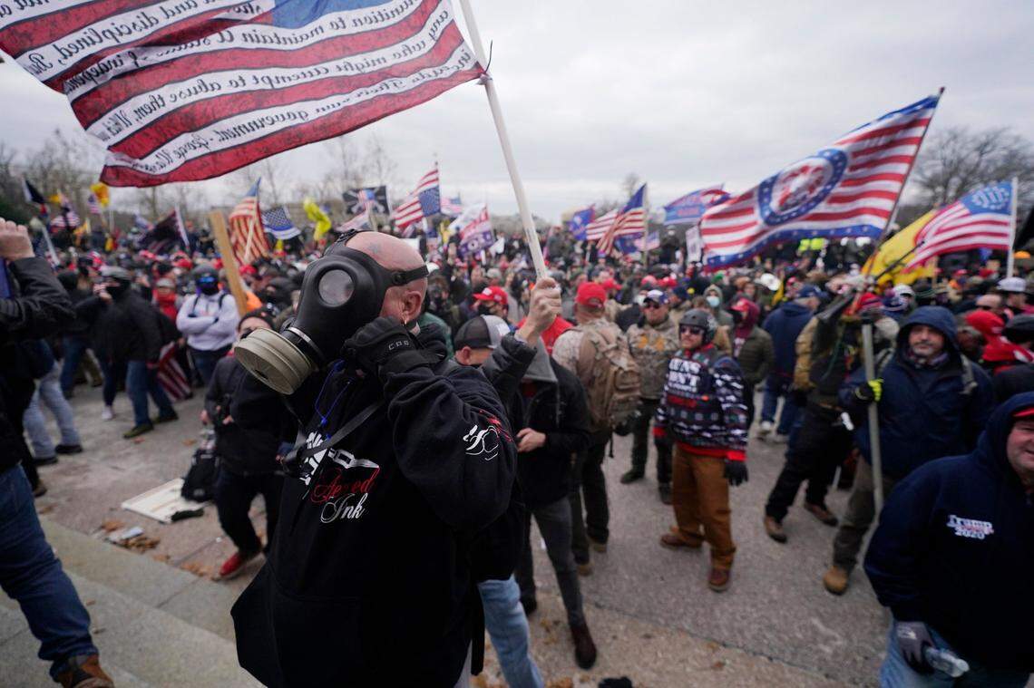 Trump supporters gather outside the Capitol, Wednesday, Jan. 6, 2021, in Washington. As Congress prepares to affirm President-elect Joe Biden’s victory, thousands of people have gathered to show their support for President Donald Trump and his claims of election fraud.