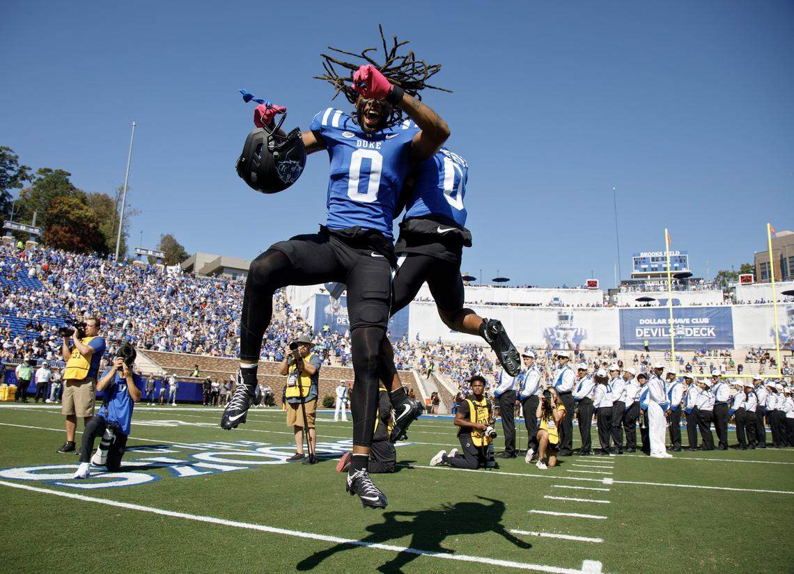 Duke’s Landen King greets teammate Chandler Rivers during the team introductions prior to the Blue Devils’ game against Georgia Tech on Saturday, Oct. 18, 2025, at Wallace Wade Stadium in Durham, N.C.