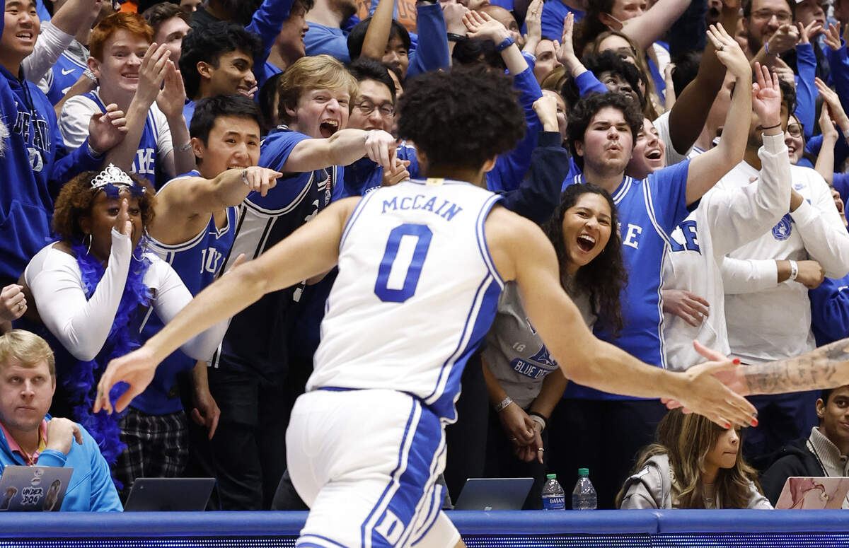 The fans celebrate after Duke’s Jared McCain (0) hit a three-pointer during the second half of Duke’s 86-66 victory over Syracuse at Cameron Indoor Stadium in Durham, N.C., Tuesday, Jan. 2, 2024.