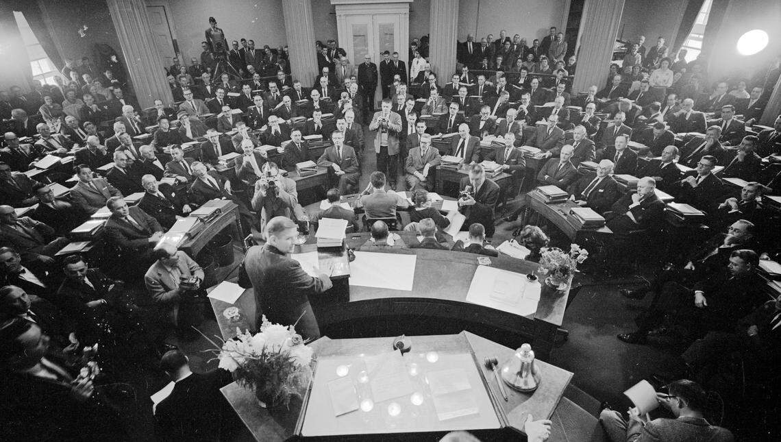 North Carolina General Assembly meets in House chambers holding a joint session June 8-9, 1961, and Terry Sanford is speaking from the podium. State Capitol, Raleigh, NC.