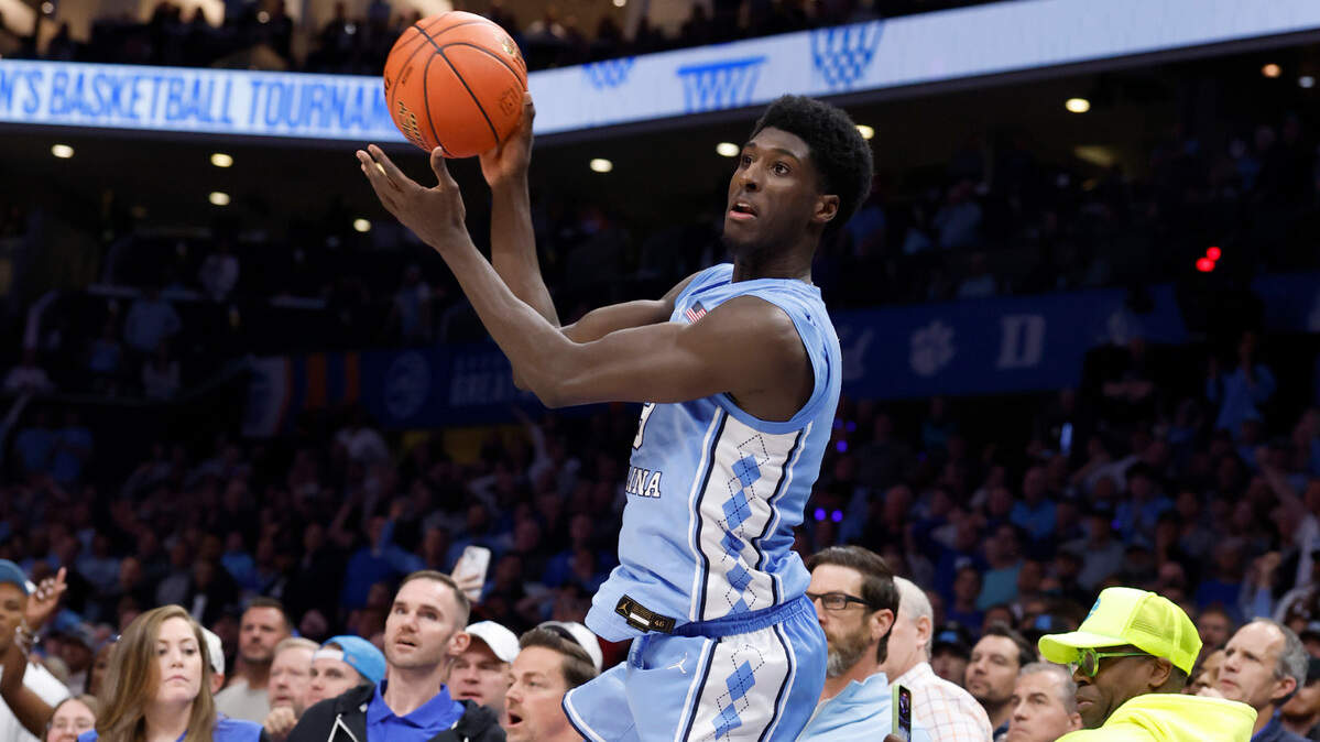 North Carolina’s Drake Powell (9) saves the ball from going out bounds during the second half of Duke’s 74-71 victory over UNC in the semifinals of the 2025 ACC Men’s Basketball Tournament at the Spectrum Center in Charlotte, N.C., Friday, March 14, 2025.