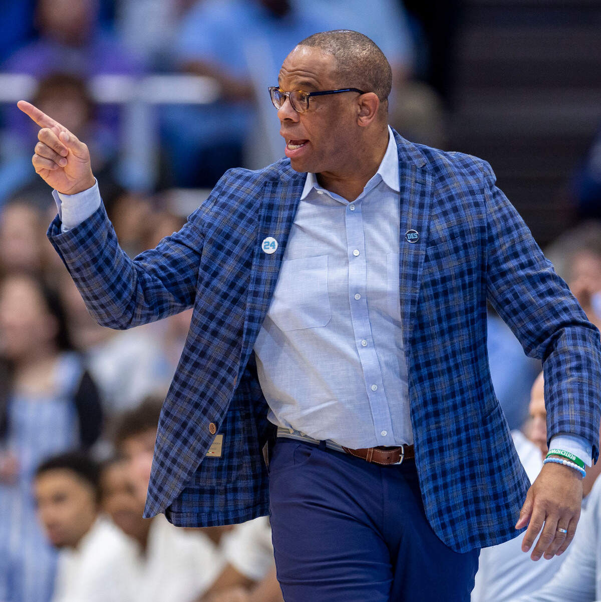 North Carolina coach Hubert Davis directs his team on offense in the first half against Virginia on Saturday, February 22, 2025 at the Smith Center in Chapel Hill, N.C.