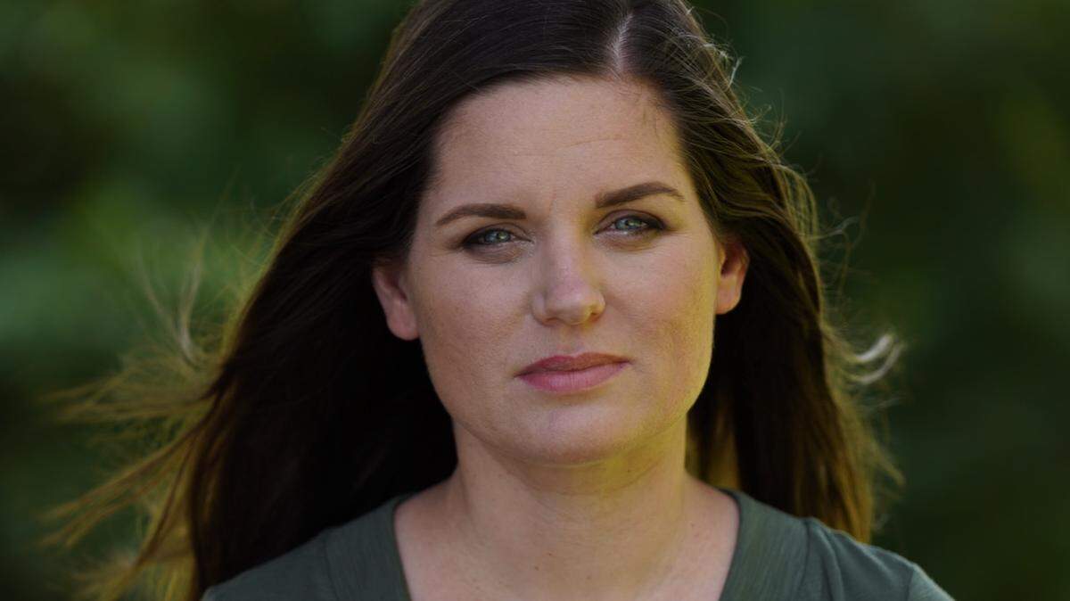 Sabrina Caldwell, adopted from Russia by a Georgia couple as a child, is interviewed as an adult by Troy Roberts for “48 Hours” from her home in Charlotte, NC.