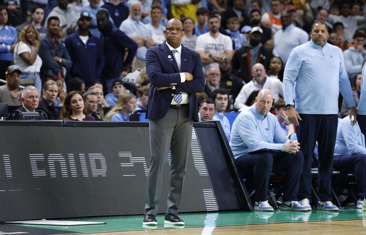 North Carolina head coach Hubert Davis watches in the closing moments of VCU’s 82-78 overtime victory over UNC in the first round of the NCAA Men’s Basketball Tournament at  Bon Secours Wellness Arena in Greenville, S.C., Thursday, March 19, 2026.