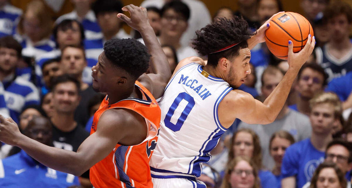 Duke’s Jared McCain (0) pulls in the rebound from Bucknell’s Pip Ajayi (23) during the second half of Duke’s 90-60 victory over Bucknell at Cameron Indoor Stadium in Durham, N.C., Friday, Nov. 17, 2023.
