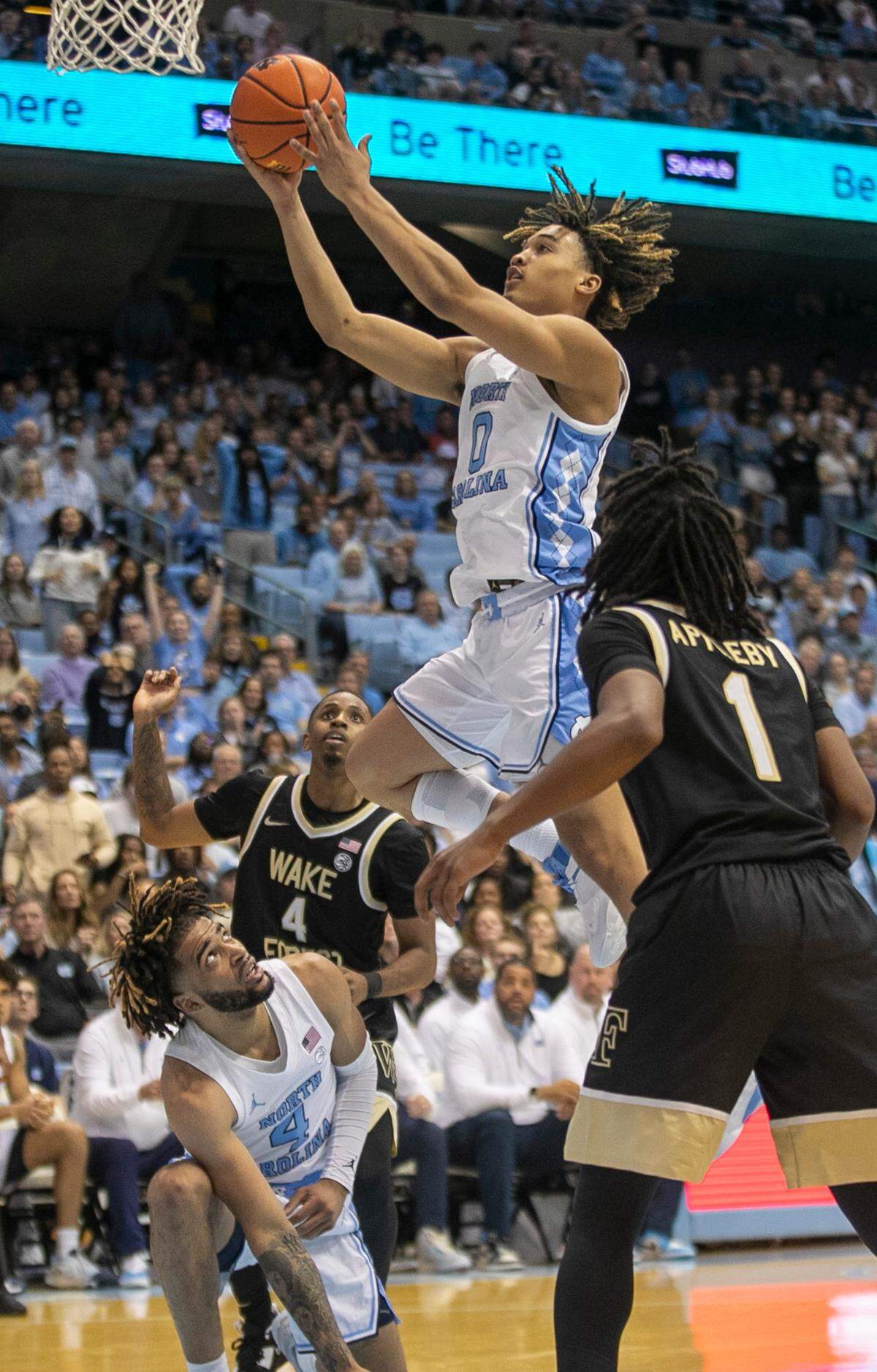 North Carolina’s R.J. Davis (4) glances up as teammate Seth Trimble (0) who scores in the second half on Wednesday, January 4, 2023 at the Smith Center in Chapel Hill, N.C.