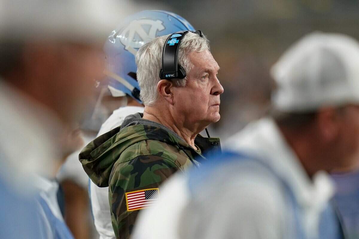 North Carolina coach Mack Brown watches the team play Pittsburgh during the first half of an NCAA college football game Thursday, Nov. 11, 2021, in Pittsburgh. (AP Photo/Keith Srakocic)