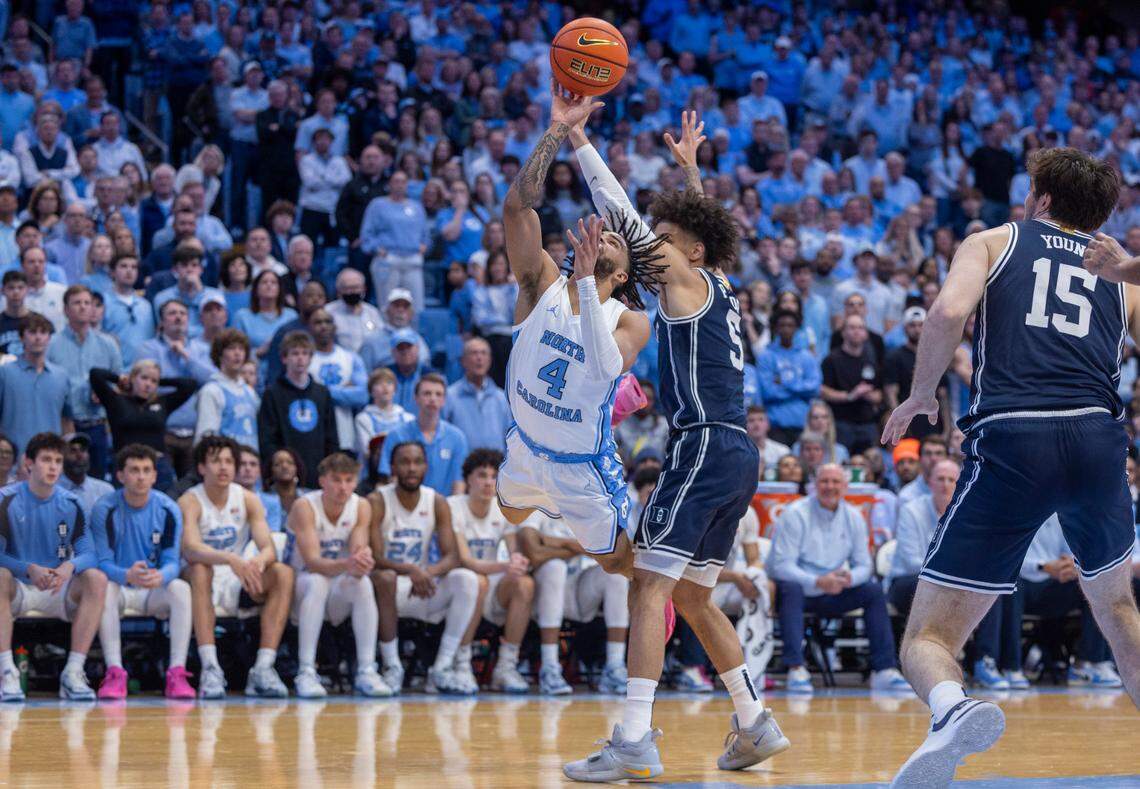 North Carolina’s R.J. Davis (4) drives to the basket against Duke’s Tyrese Proctor (5) in the second half on Saturday, February, 3, 2024 at the Dean E. Smith Center in Chapel Hill, N.C.