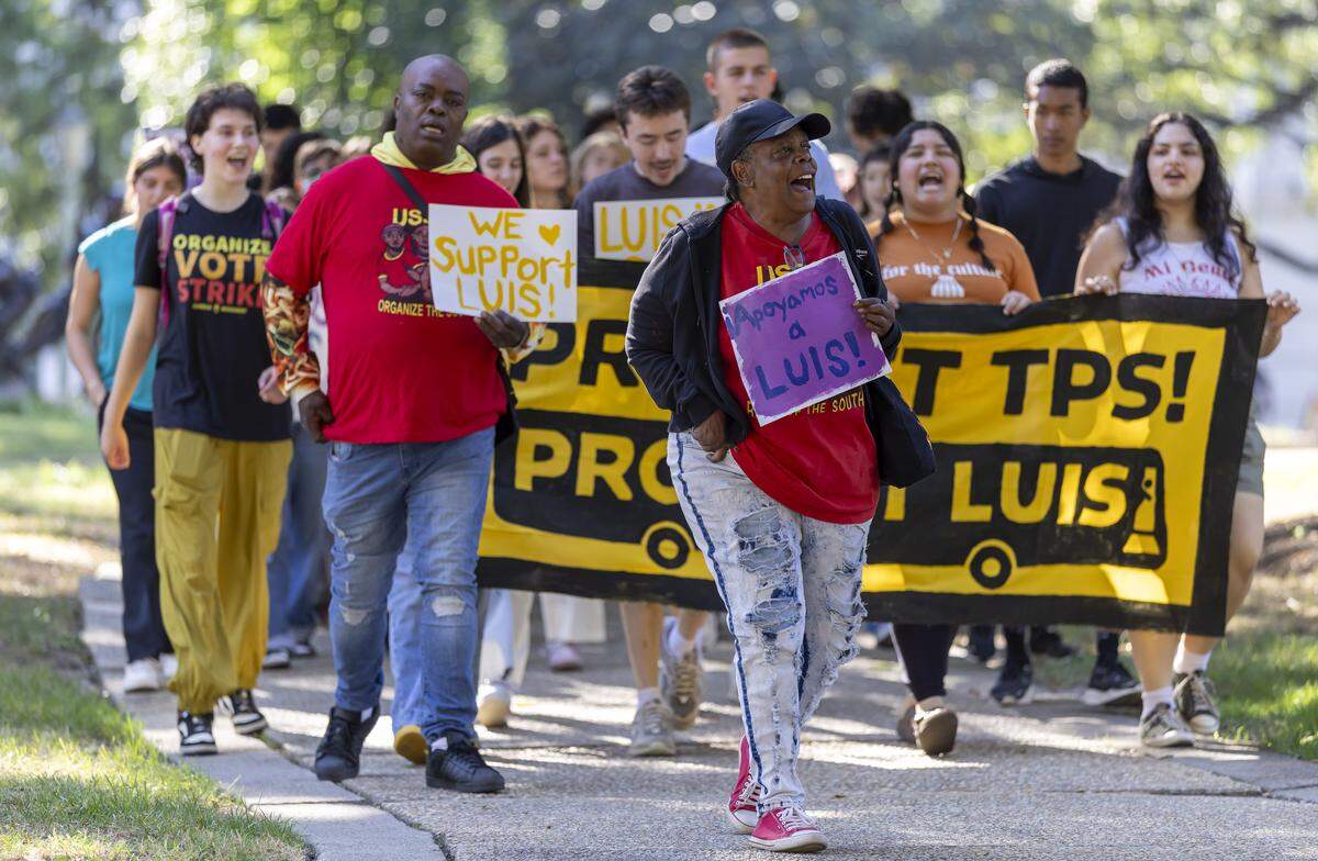 Supporters of Duke University bus driver Luis Alonso Juárez march across Capital Square to the General Assembly on Thursday, September 4, 2025 in Raleigh, N.C. to lobby for support for Juárez, an Honduran immigrate that could face deportation.