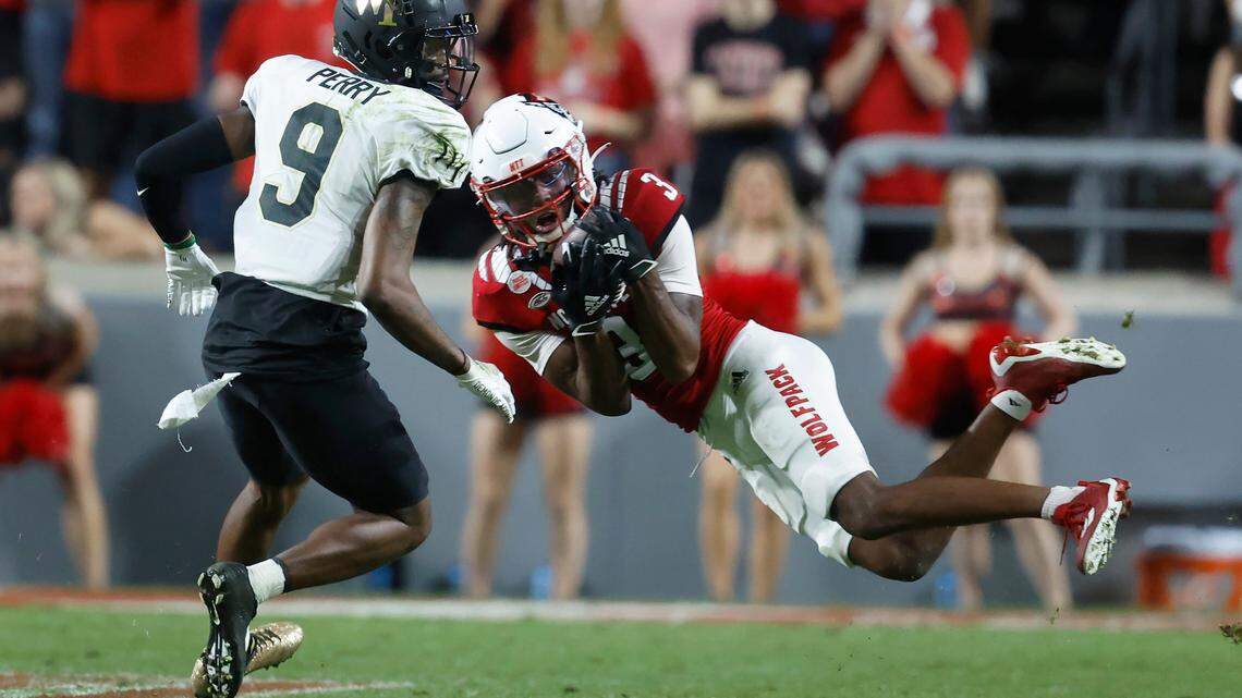 N.C. State’s Aydan White (3) intercepts the ball intended for Wake Forest wide receiver A.T. Perry (9) during the second half of N.C. State’s 30-21 victory over Wake Forest at Carter-Finley Stadium in Raleigh, N.C., Saturday, Nov. 5, 2022.