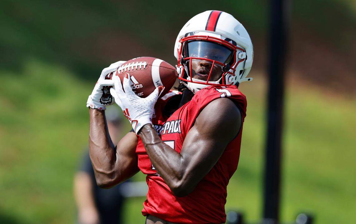 N.C. State wide receiver Noah Rogers (5) pulls in a reception during the Wolfpack’s first practice in Raleigh, N.C., Wednesday, July 31, 2024.