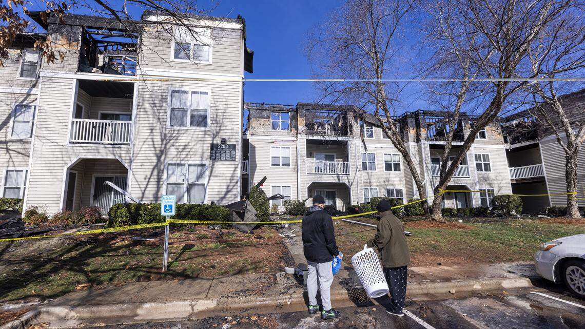 The scene at the Camden Westwood apartments at 2100 Summit Ridge Loop in Morrisville following a three-alarm fire that began Monday evening. The blaze ignited around 6 p.m. at one of the complex’s residential buildings. The fire affected 30 apartments and displaced approximately 70 residents. One person was taken to a local hospital for treatment while five others were treated at the scene for smoke inhalation.