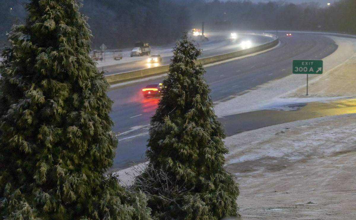 Traffic moves along I-40 at Rock Quarry Road just before sunrise on Monday January 26, 2026 in Raleigh, N.C. The main roads are mostly clear following a round of winter storms that moved through the area over the weekend.