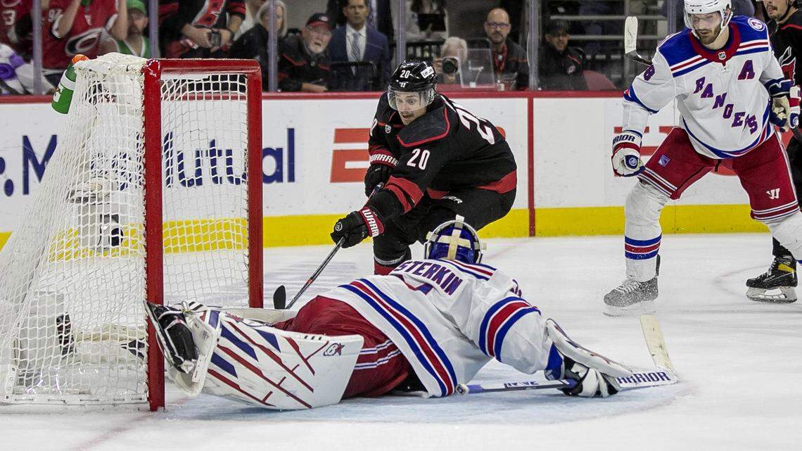 Carolina Hurricanesí Sebastian Aho (20) scores on New York Rangersí goalie Igor Shesterkin (31) in the third period to tie the score 1-1 and force overtime on Wednesday, May 18, 2022 during game one of the Stanley Cup second round at PNC Arena in Raleigh, N.C.