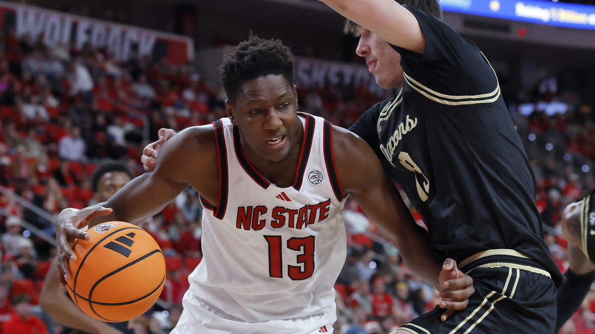 N.C. State’s Musa Sagnia drives against Wake Forest’s Cooper Schwieger during the first half of the Wolfpack’s 70-57 win on Wednesday, Dec. 31, 2025, at Lenovo Center in Raleigh, N.C.