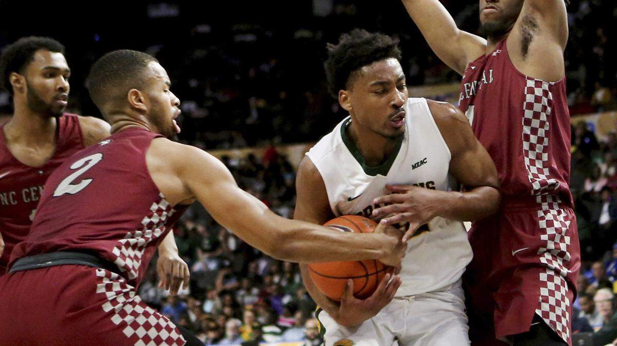 North Carolina Central’s Jibri Blount, left, strips the ball from Norfolk State’s Alex Long during an NCAA college basketball game in the championship of the Mid-Eastern Athletic Conference tournament, Saturday, March 16, 2019, in Norfolk, Va.