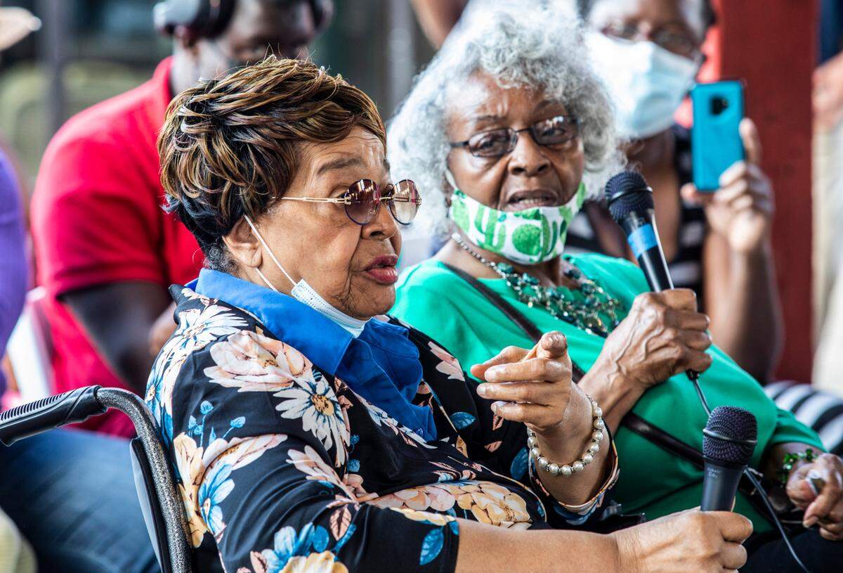 Mary (Clyburn) Hooks, left, and Virginia Williams, two civil rights activists who took part in the 1957 Royal Ice Cream sit-in, speak during a commemoration of the protest at the Museum of Durham History, Wednesday evening, June, 23, 2021. One of the original Royal Ice Cream signs is now on permanent display at the museum.