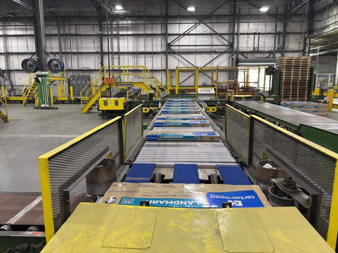 Landmark shingles from the Saint-Gobain subsidiary CertainTeed leave the assembly line in Oxford, N.C. on July 9, 2025.
