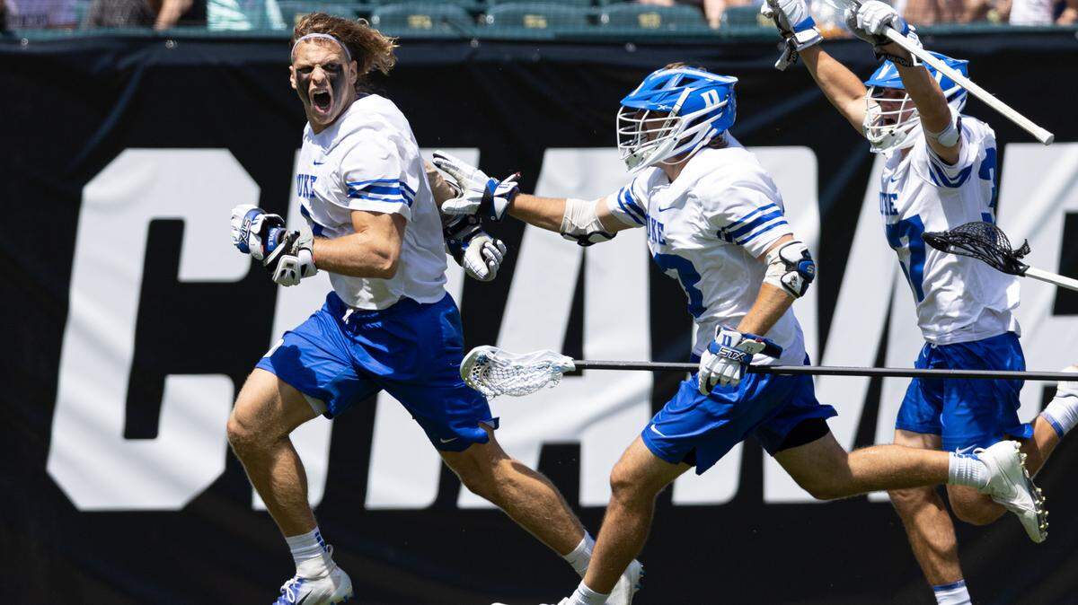 Duke Blue Devils midfielder Garrett Leadmon (1) celebrates with teammates after scoring the game winning goal during overtime against the Penn State Nittany Lions at Lincoln Financial.