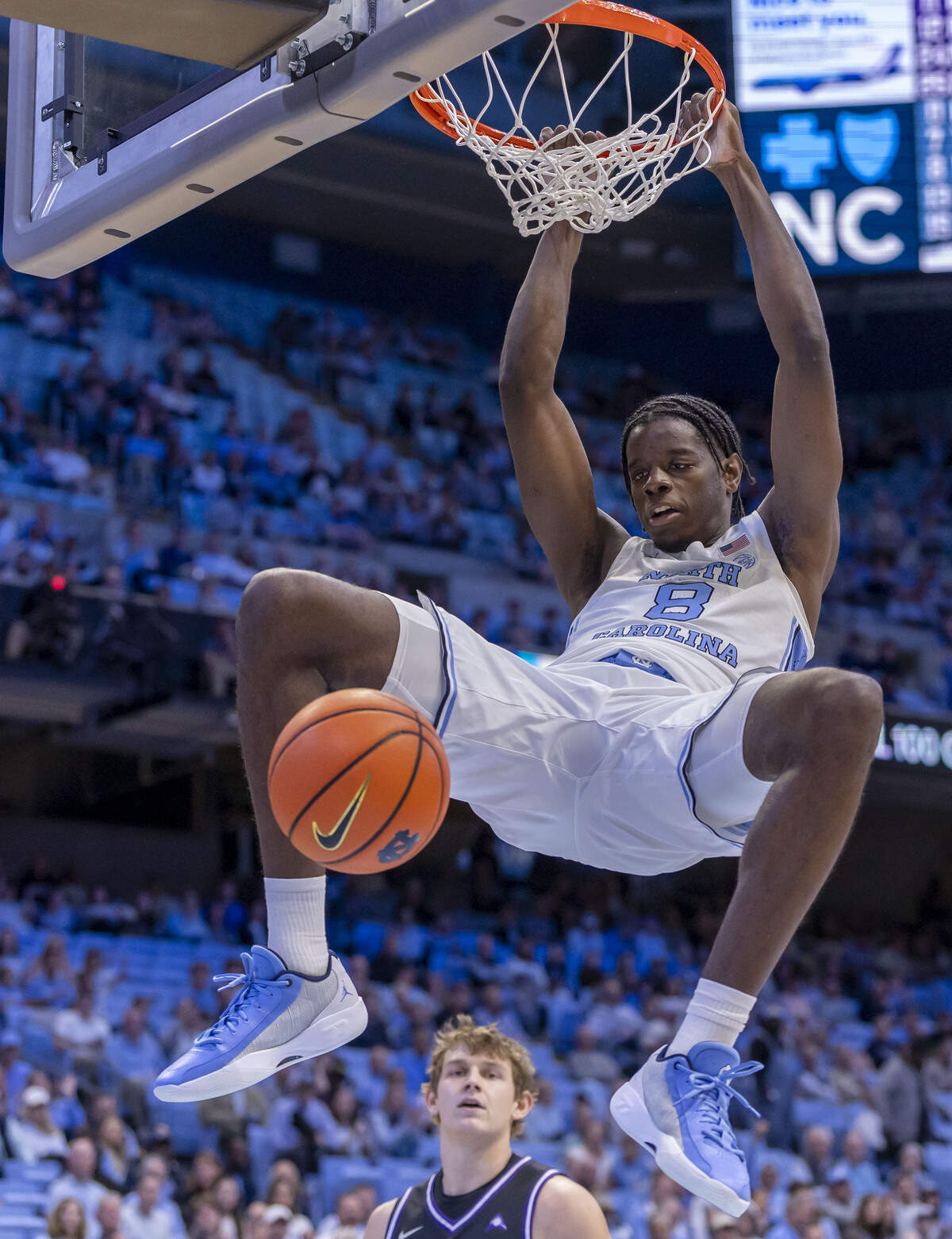 North Carolina forward Caleb Wilson (8) dunks in the first half against Central Arkansas on Monday, November 3, 2025 at the Smith Center in Chapel Hill, N.C.
