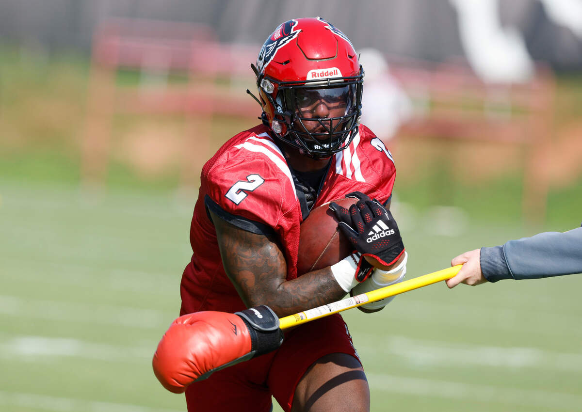 N.C. State linebacker Jaylon Scott (2) runs drills during the Wolfpack’s first practice of fall camp in Raleigh, N.C., Wednesday, August 3, 2022.