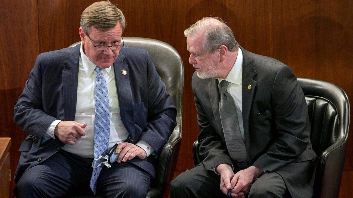 House Speaker Tim Moore, left, and Senate leader Phil Berger have both praised Lee Robert’s leadership at UNCH-Chapel Hill.