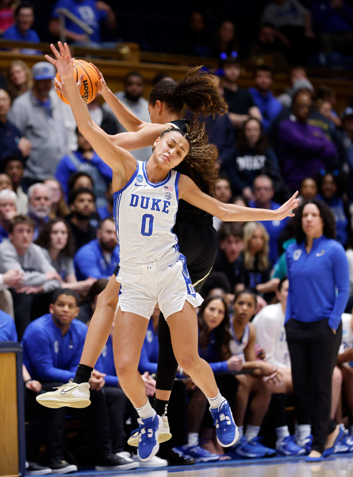 Duke’s Celeste Taylor defends a downcourt pass to Colorado’s Tayanna Jones during the first half of an NCAA Tournament second round game at Cameron Indoor Stadium on Monday, March 20, 2023, in Durham, N.C.