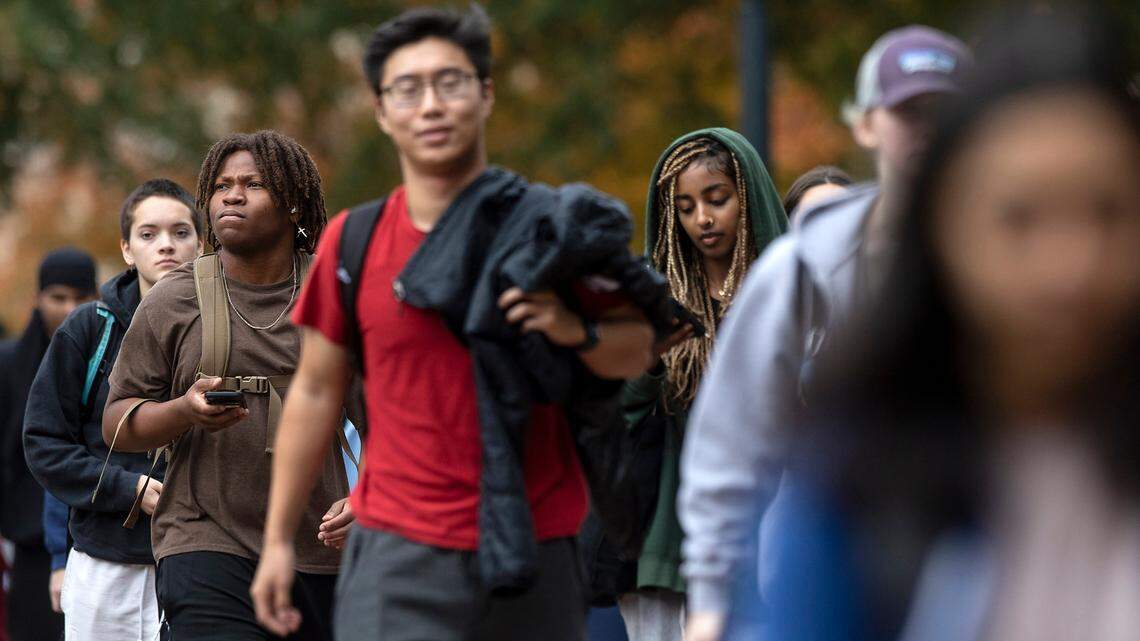 People walk through the campus of UNC-Chapel Hill on Monday, Oct. 31, 2022, in Chapel Hill, N.C. The U.S. Supreme Court on Monday will hear oral arguments in Students for Fair Admissions v. University of North Carolina, a case regarding race-conscious admission practices at institutions of higher education.