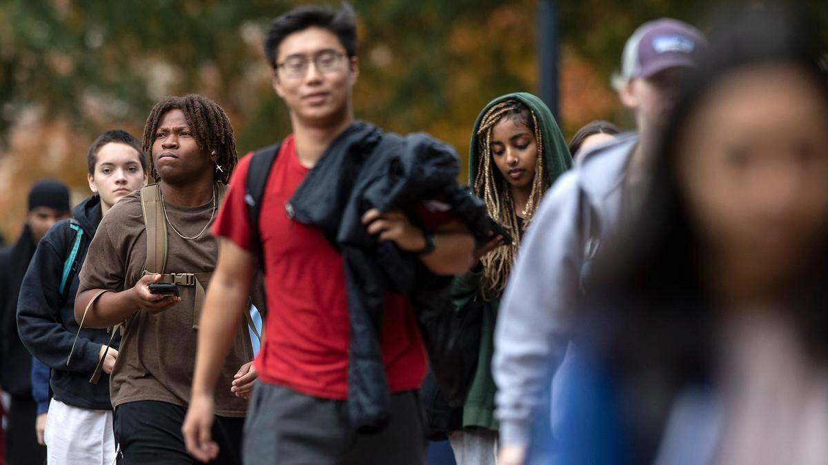 People walk through the campus of UNC-Chapel Hill on Monday, Oct. 31, 2022, the day the U.S. Supreme Court heard oral arguments in Students for Fair Admissions v. University of North Carolina. The issue before the court is the use of race in higher education admissions practices, including at UNC-Chapel Hill.