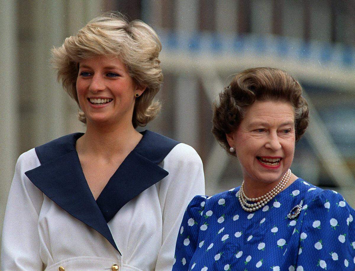 In this Aug. 4, 1987 file photo, Britain’s Diana, Princess of Wales, left, and Britain’s Queen Elizabeth II smile to well-wishers outside Clarence House in London.For someone who began her life in the spotlight as “Shy Di,” Princess Diana became an unlikely, revolutionary during her years in the House of Windsor.
