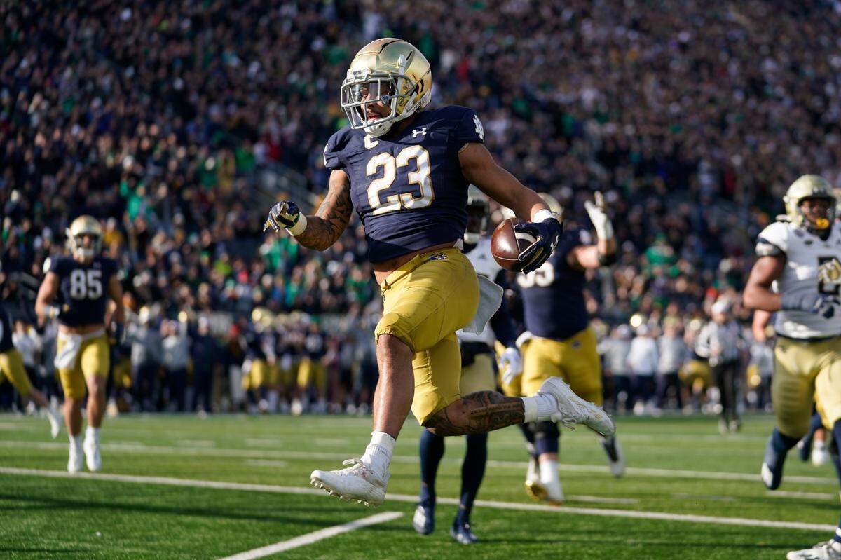 Notre Dame running back Kyren Williams (23) scores during a game against Georgia Tech on Nov. 20, 2021, in South Bend, Ind.