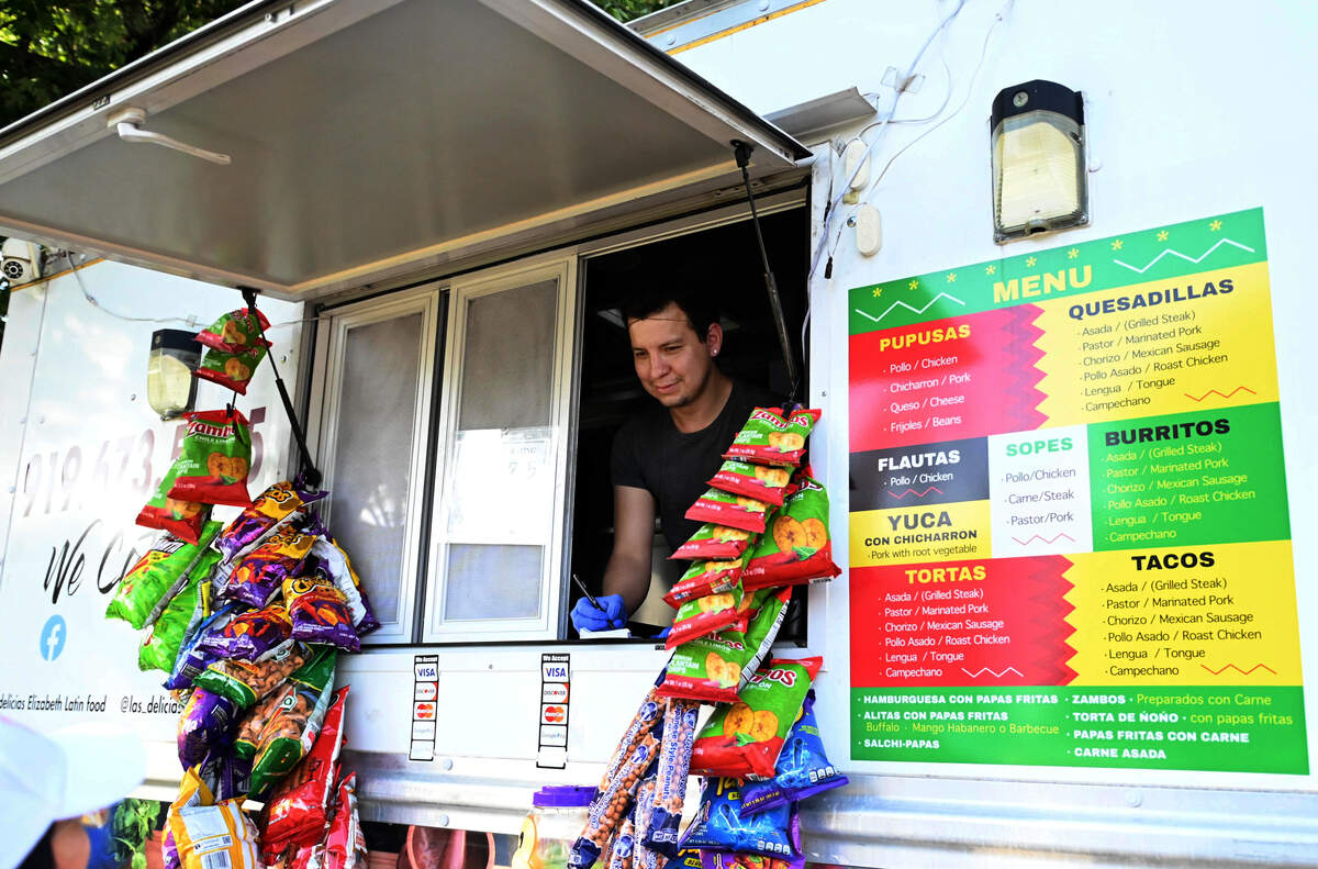 José Rutilo Bautista Hernández, 30, works at “Las Delicias,” a Latin food truck parked most days inside The Pointe at Midtown in Raleigh’s North Hills.