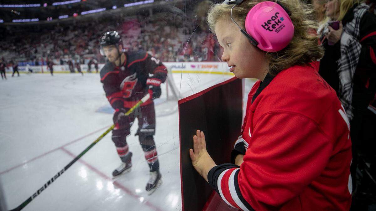 Twelve-year-old Emma Izzo of New Bern, N.C. watches the Carolina Hurricanes’ pre-game skate prior to their game against Tampa Bay on Sunday, May 30, 2021 at PNC Arena in Raleigh, N.C.