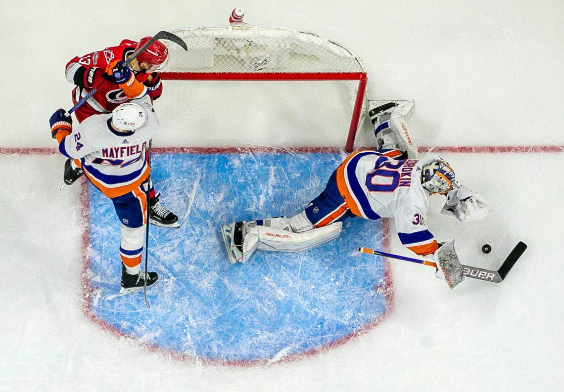 New York Islanders goalie Ilya Sorokin (30) makes a save against the Carolina Hurricanes in the third period during Game 5 of their Stanley Cup series on Tuesday, April 25, 2023 at PNC Arena in Raleigh, N.C. Sorokin made 34 saves in the Islanders’ 3-2 victory.