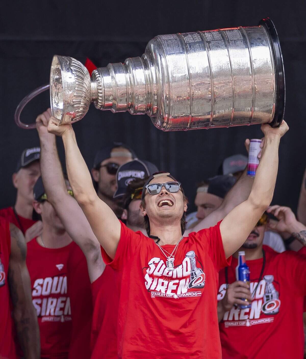 Carolina Hurricanes center Sebastian Aho hoists the Stanley Cup, during the rally on the City Plaza on Saturday, June 20, 2026 in Raleigh, NC.