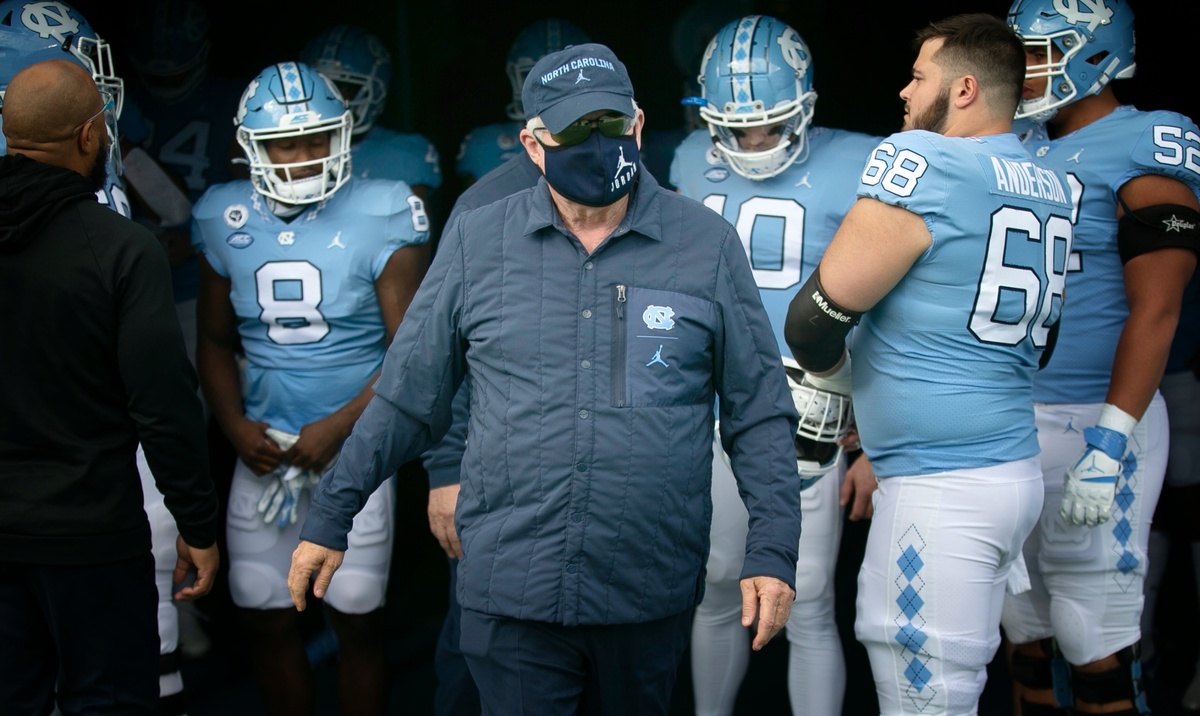 North Carolina coach Mack Brown enters the field prior to the Tar Heels’ game against Western Carolina on Saturday, December 5, 2020 at Kenan Stadium in Chapel Hill, N.C.